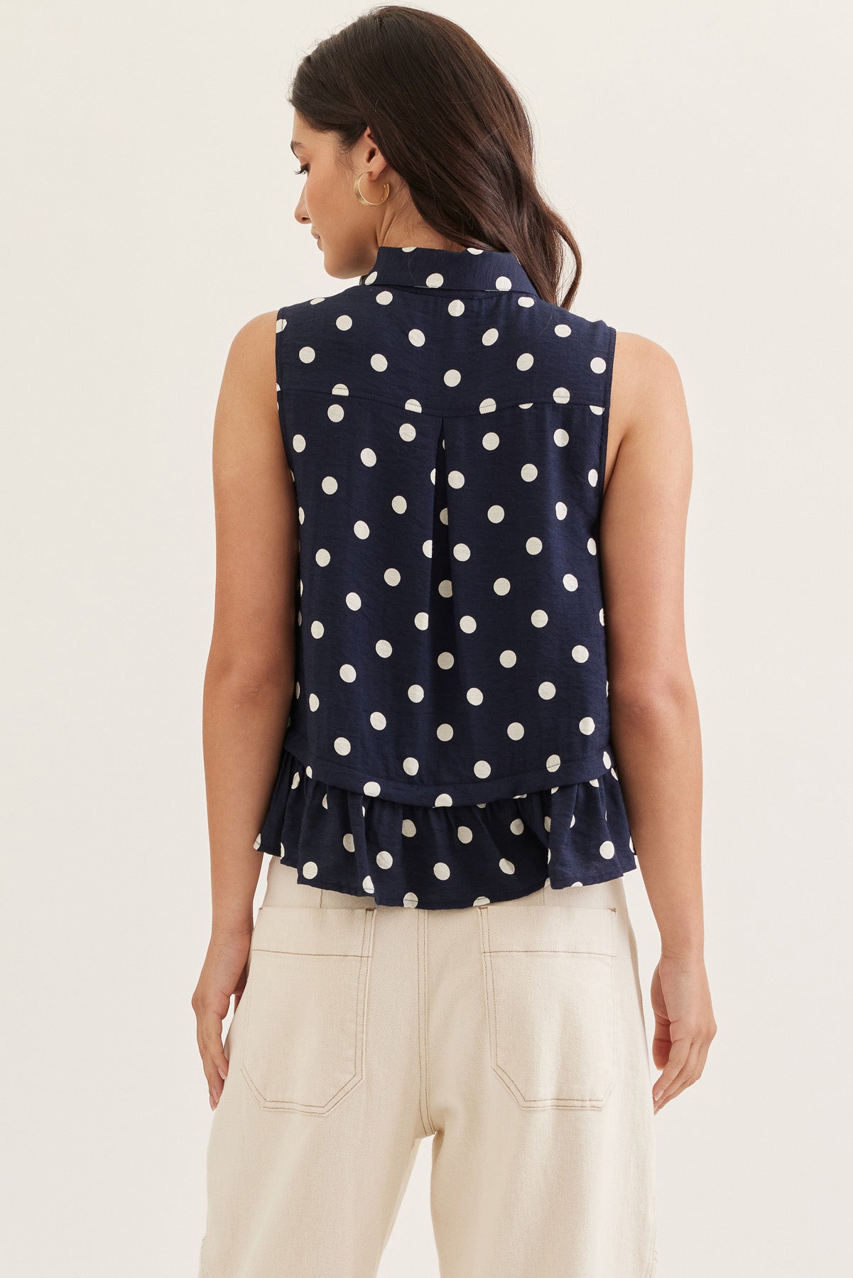 Navy Polka Dot Sleeveless Top Featuring Self Tie Neck