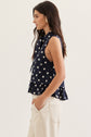 Navy Polka Dot Sleeveless Top Featuring Self Tie Neck