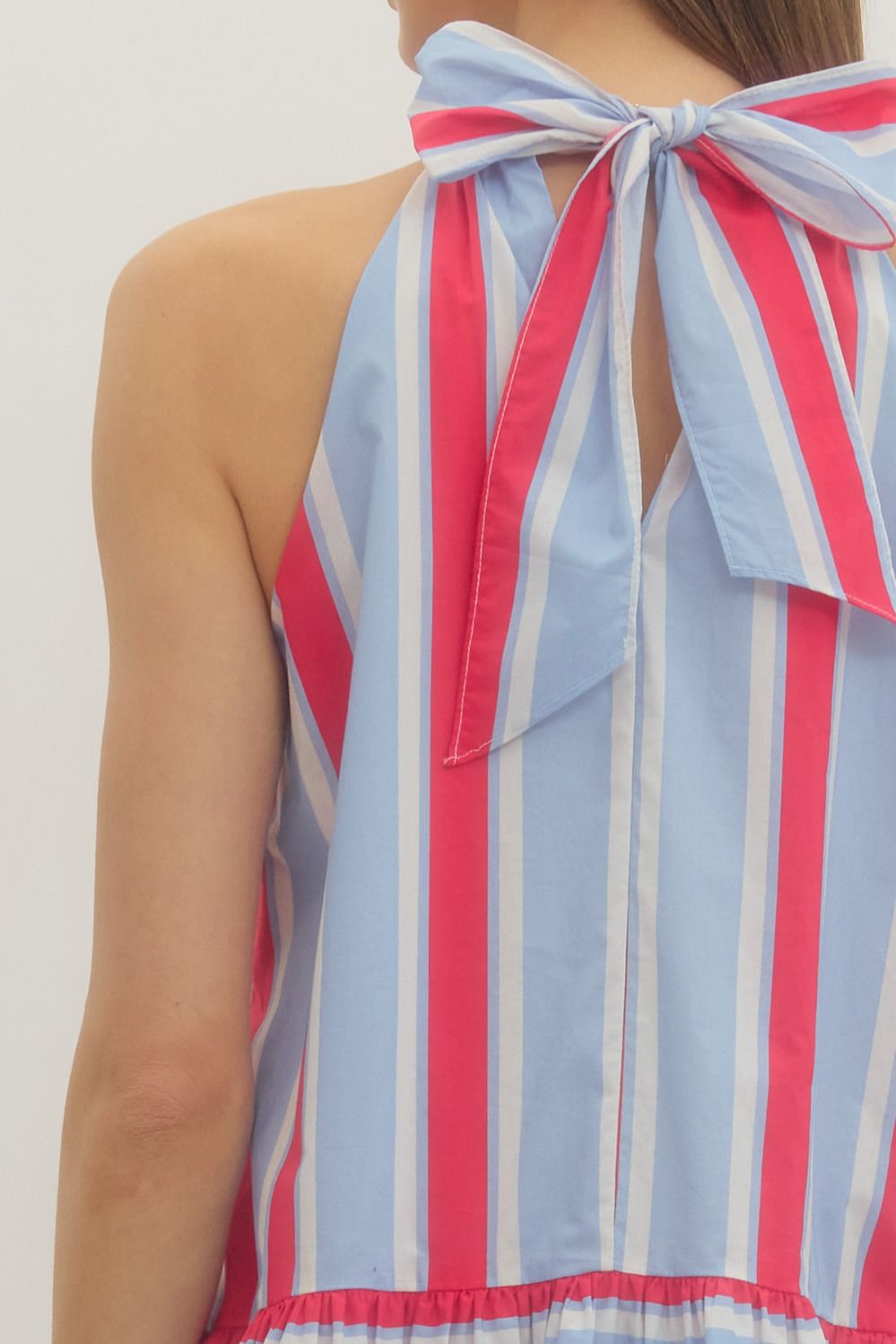 Striped sleeveless mini dress featuring back neck tie