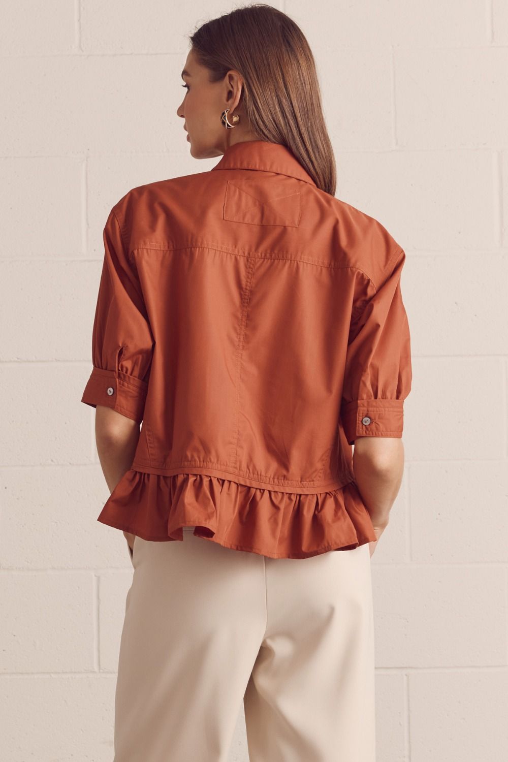 Solid Short Sleeve Button Down Top Featuring Ruffle Hem