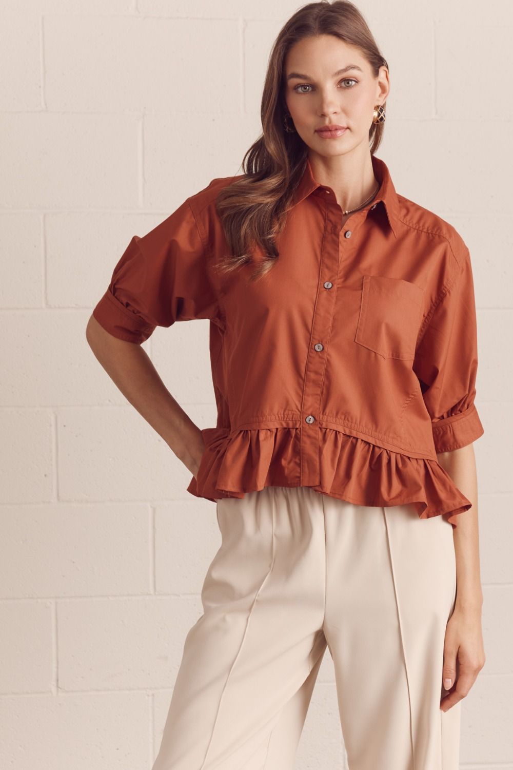 Solid Short Sleeve Button Down Top Featuring Ruffle Hem