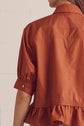 Solid Short Sleeve Button Down Top Featuring Ruffle Hem