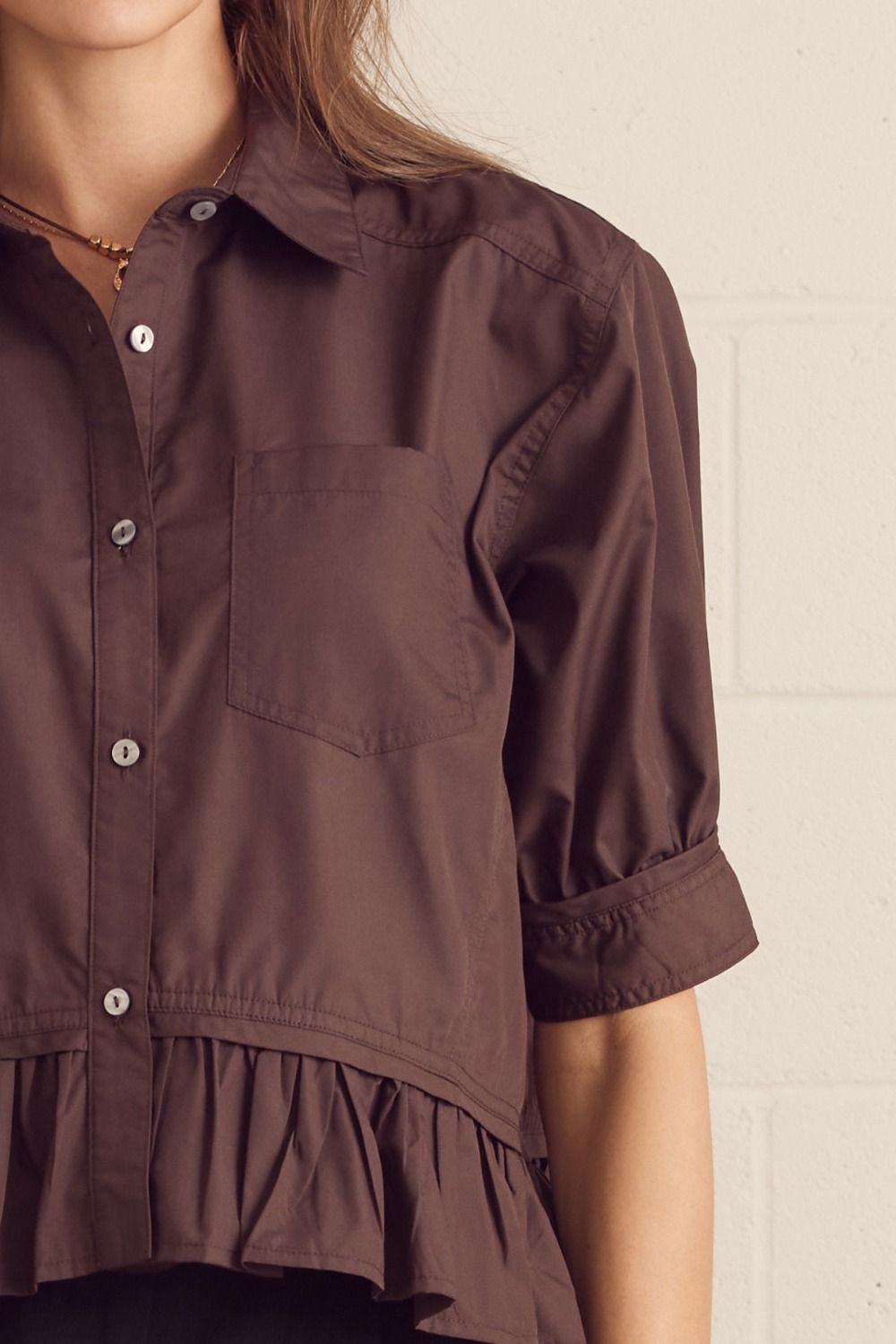 Solid Short Sleeve Button Down Top Featuring Ruffle Hem