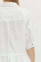 Solid Short Sleeve Button Down Top Featuring Ruffle Hem