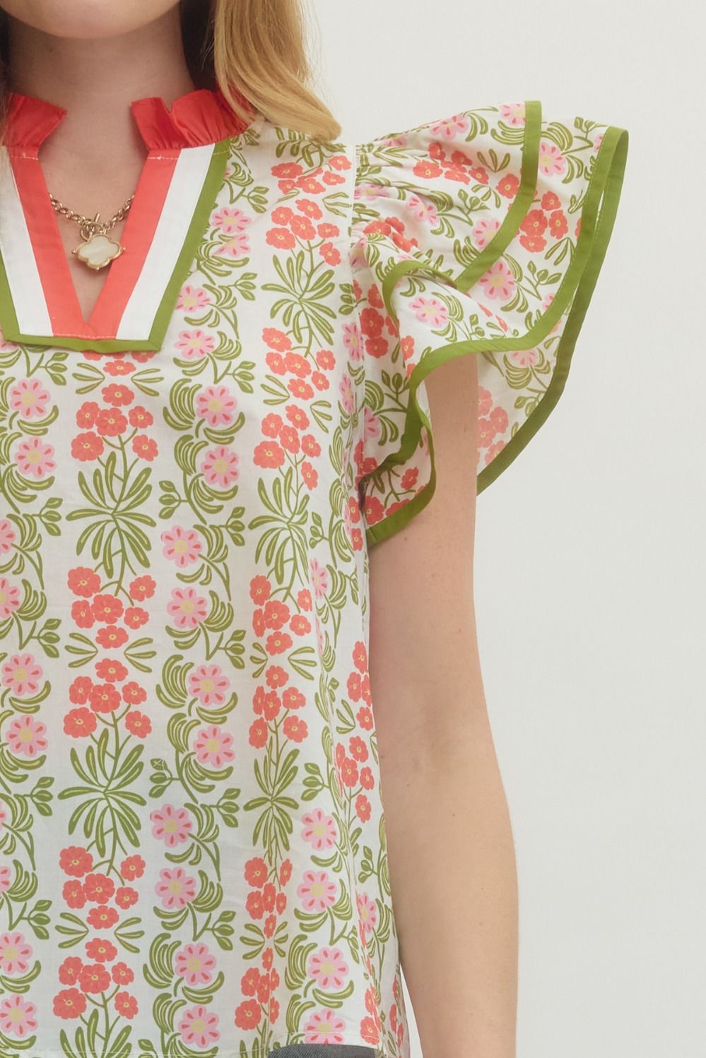 Floral Flutter Sleeve Top Featuring Contrast Trim Neckline
