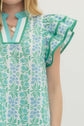 Floral Flutter Sleeve Top Featuring Contrast Trim Neckline