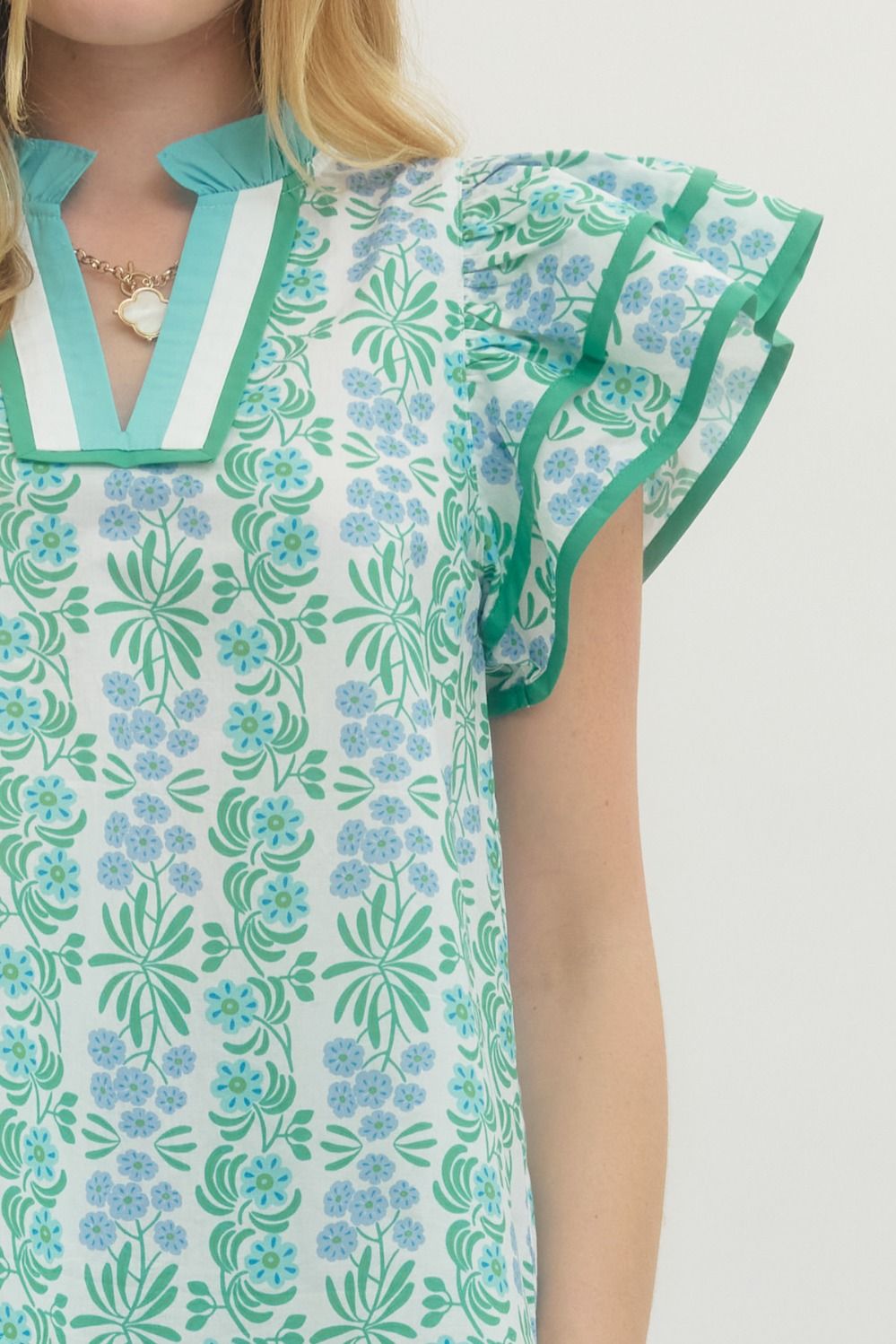Floral Flutter Sleeve Top Featuring Contrast Trim Neckline