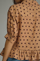 Polka Dot Top Featuring Ruffle Hem
