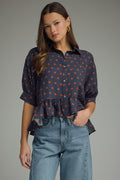 Polka Dot Top Featuring Ruffle Hem