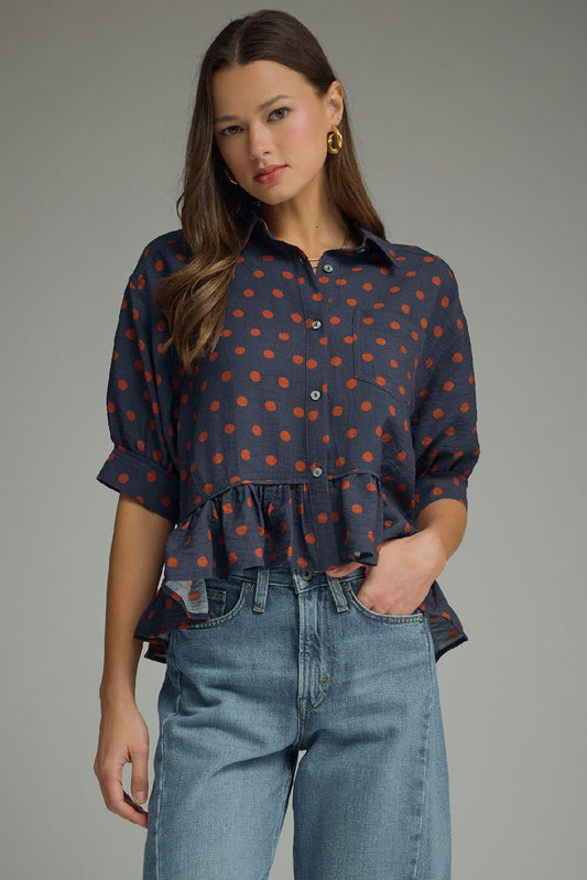 Polka Dot Top Featuring Ruffle Hem
