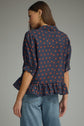 Polka Dot Top Featuring Ruffle Hem